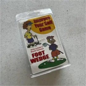865-140 Leiter Game & Novelty Co. Llc And Foot Wedge Golf Shoe Accessory Black Fits Any Size