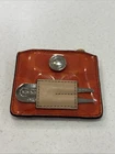 Coach Coral Embossed Patent Leather Golf Divot Wood Tees With Case Used. Price: $34.99.
