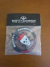 Brand New 2025 Scotty Cameron Halloween "tour Jester" Aluminum Bag Tag. Price: $149.99.