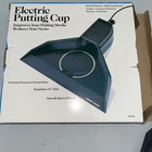 Green Eagle Electric Putting Cup Tested Working Like Used. Price: $12.00.