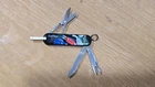 Victorinox Swiss Army Caddy 58MM Folding Knife Golf Tool New. Price: $36.00.