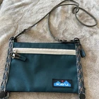 Kavu Tahom 2-IN-1 Crossbody Bag Travel Pouch Trail Mix Color Pre-owned. Price: $25.00.