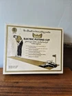 Vintage 19TH Hole Golden Eagle Electric Putting Cup 1969 W/ Box. Works Great! Used. Price: $14.00.