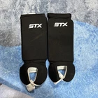 Stx Field Hockey Shin Guards Reversible Size Adult Black/white Hinged Foam New. Price: $17.50.