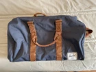 Herschel Novel Duffle Weekender Travel Bag Navy Tan Classic Shoulder Strap Pre-owned. Price: $10.00.