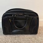 Brand New Xxio Boston Bag, High Quality Feel With Black Embellishments. Price: $129.00.