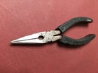 Unbranded China Made 6-1/2" Needle Nose Pliers With Extra Big Rubberized Grips Used. Price: $11.79.