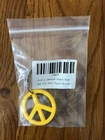 Scotty Cameron Key Fob Peace Sign Yellow Rubber-coated Metallic Titleist Nib New. Price: $14.95.