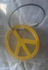 Scotty Cameron Yellow Key Fob - Soft Touch Peace Sign 2" Inch Titleist Nib New. Price: $35.00.