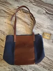 Tica Brand Leather/ Canvas Shoulder Tote Bag W/ Golf Emblem Nwt New. Price: $25.00.