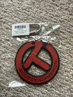 Scotty Cameron Circle Cookie Cutter Red Bag Tag / Putting Disc New. Price: $69.99.