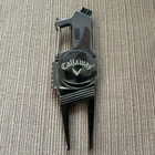 Callaway 4-IN-1 Golf Divot Repair Tool With Magnetic Ball Marker, Gun Metal Gray New. Price: $25.00.