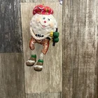 Festive Golfing Ball Santa Ornament Unspecified. Price: $16.00.