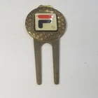 Vtg Fila Golf Divot Tool & Magnetic Ball Marker Used. Price: $21.99.