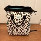 Swig Leopard Print Insulated Cooler Backpack / Tote, Zipper Broken Used. Price: $35.00.