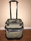 Arctic Zone Titan Deep Freeze 60 50+10 Can Collapsible Rolling Cooler Used. Price: $40.00.