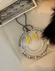 Scotty Cameron 2024 Mardi Gras Smiley Face Bag Tag New. Price: $130.00.