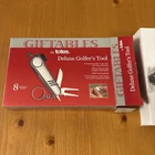 Giftables By Totes Deluxe 8 Function Compact Golfer's Multi Tool New Open Box. Price: $8.99.