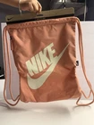 Nike Peach Drawstring Gym Bag Zip Pocket Adjustable Strap Polyester Sports New. Price: $18.73.