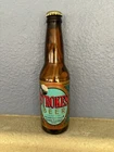 Strokes Glass Beer Bottle W/75 Wood Golf Tees Gift Sealed New. Price: $7.00.