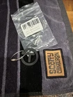 Scotty Cameron Black Circle Ct Key Fob - Gallery New Bag Tag. Price: $49.99.