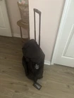 Titleist Travel Gear Black Golf Rolling Duffel Bag Luggage- Usf Charlie Strong New. Price: $119.99.