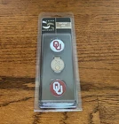 Team Effort Golf Hat Clip Ball Markers / Oklahoma Sooners - New Original Package. Price: $12.00.